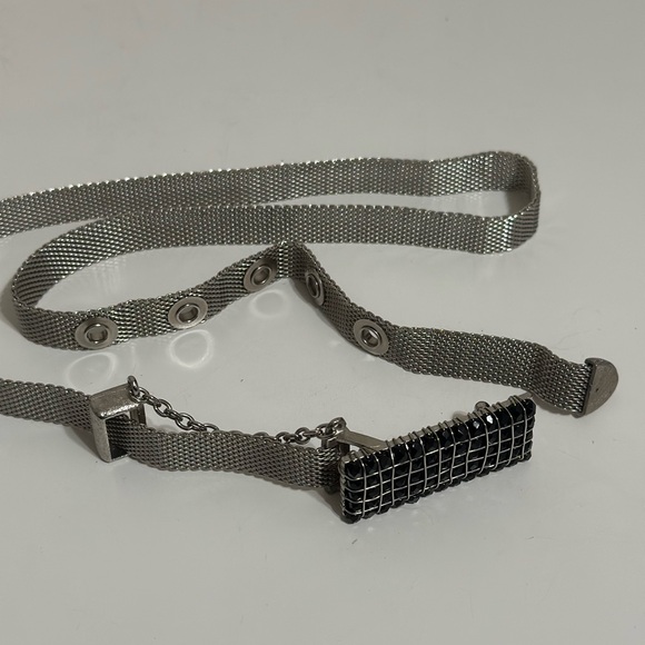 silver-tone metal mesh belt with a black accent Bucket